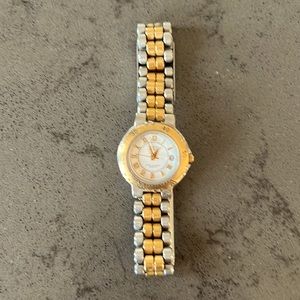 Woman’s two tone Anne Klein watch